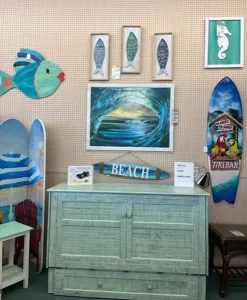 hidden murphy bed surrounded by pictures